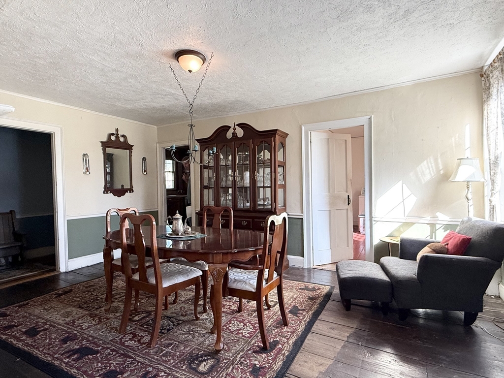 334 Elm Street West Springfield, MA 01089 - Photo 19 of 42 a view of a livingroom with furniture window and wooden floor