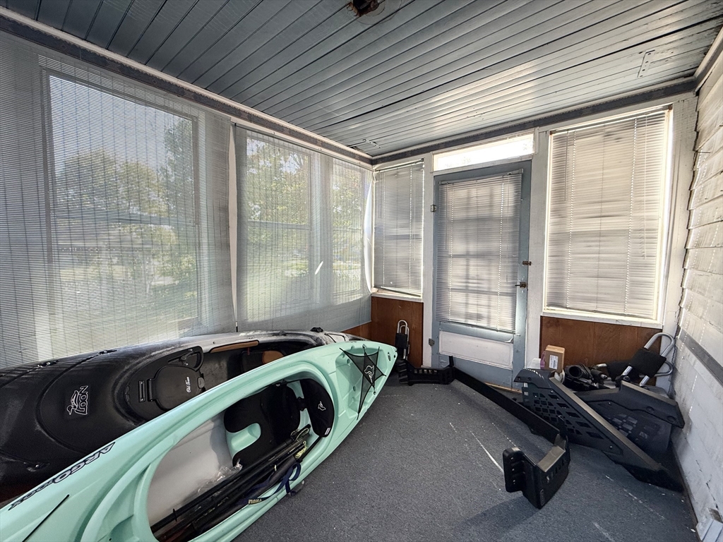 334 Elm Street West Springfield, MA 01089 - Photo 23 of 42 a bed sitting in a bedroom next to a large window