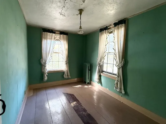 a view of a living room and a window