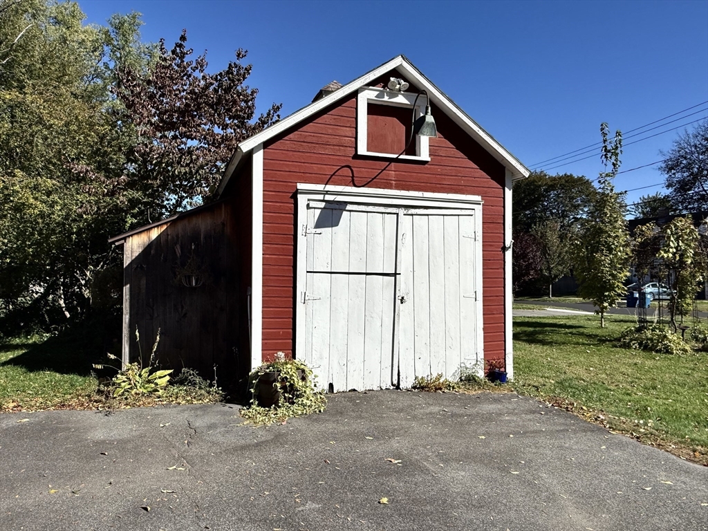 334 Elm Street West Springfield, MA 01089 - Photo 39 of 42 a front view of a house with a yard