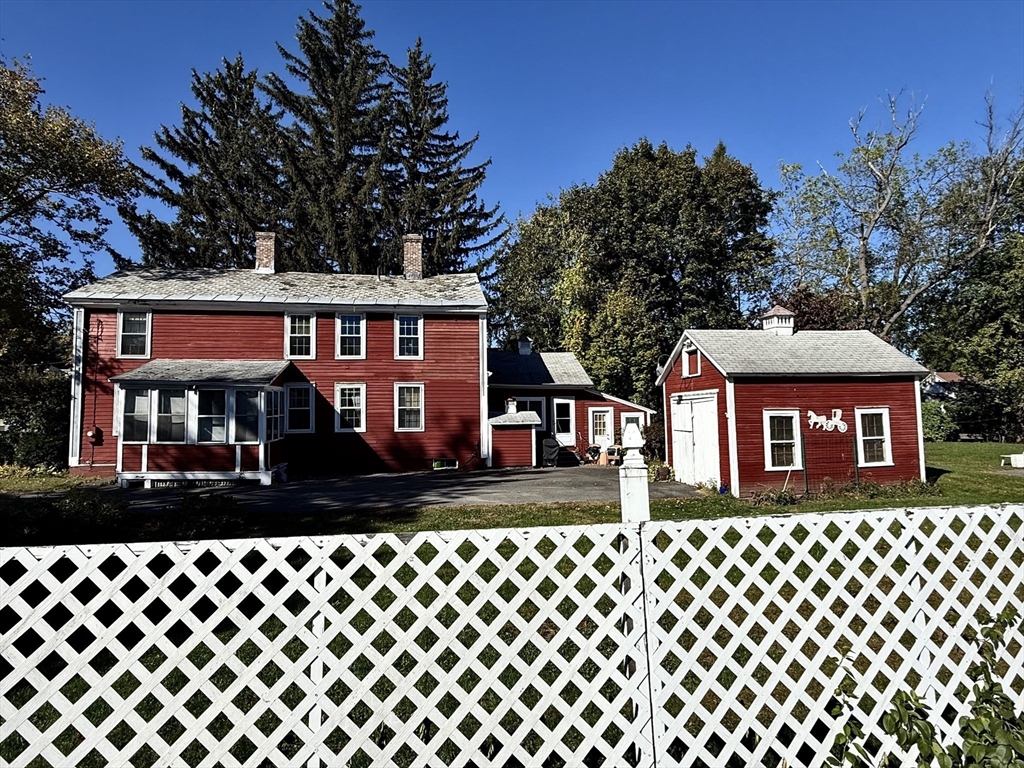 334 Elm Street West Springfield, MA 01089 - Photo 7 of 42 a front view of a house with a yard
