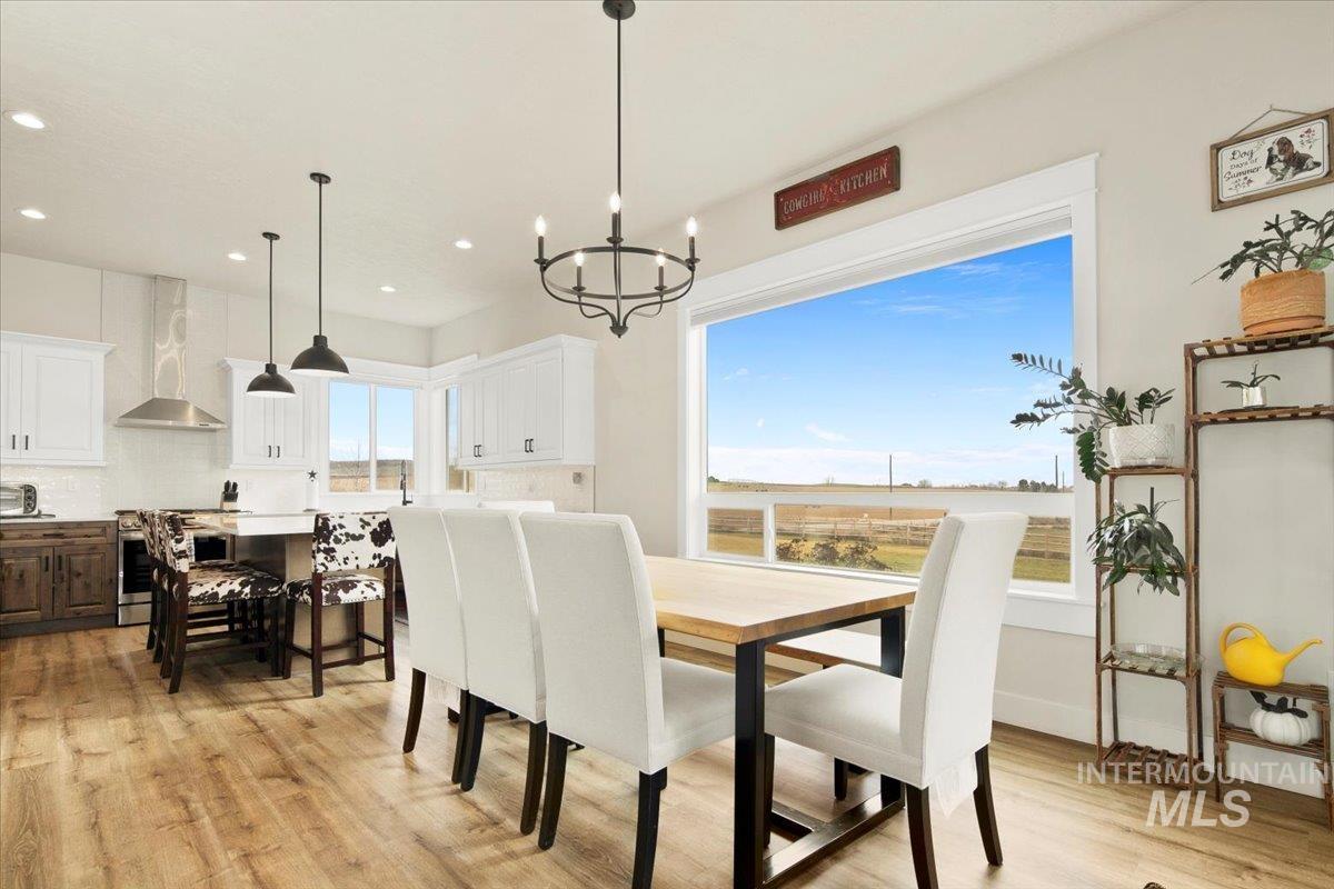 6721 El Paso Road Caldwell, ID 83607 - Photo 14 of 50 Dining room with light wood finished floors, a chandelier, and recessed lighting