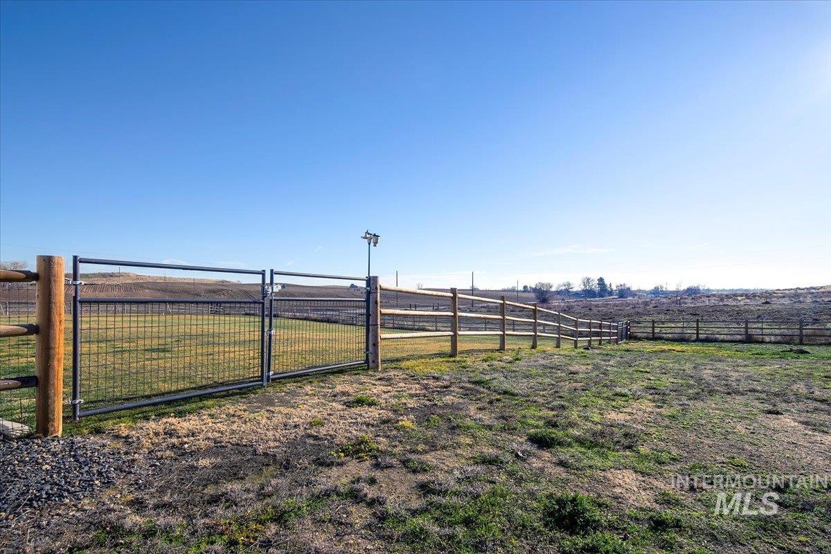 6721 El Paso Road Caldwell, ID 83607 - Photo 24 of 50 View of yard featuring a gate and a view of countryside