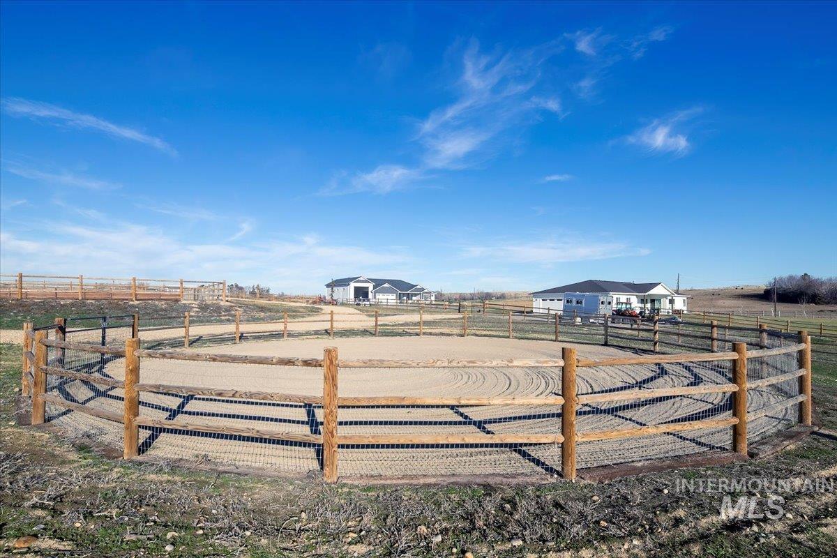 6721 El Paso Road Caldwell, ID 83607 - Photo 38 of 50 View of yard featuring an outdoor riding arena and a rural view