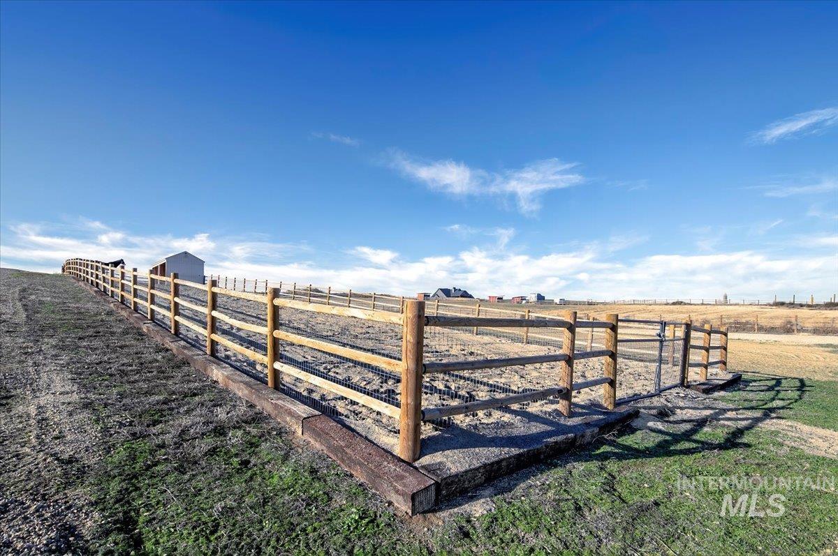 6721 El Paso Road Caldwell, ID 83607 - Photo 41 of 50 View of yard featuring a view of countryside and an outdoor structure