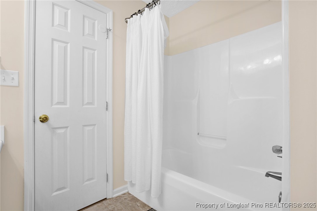 101 2 Hours Court Raeford, NC 28376 - Photo 15 of 30 a bathroom with a shower