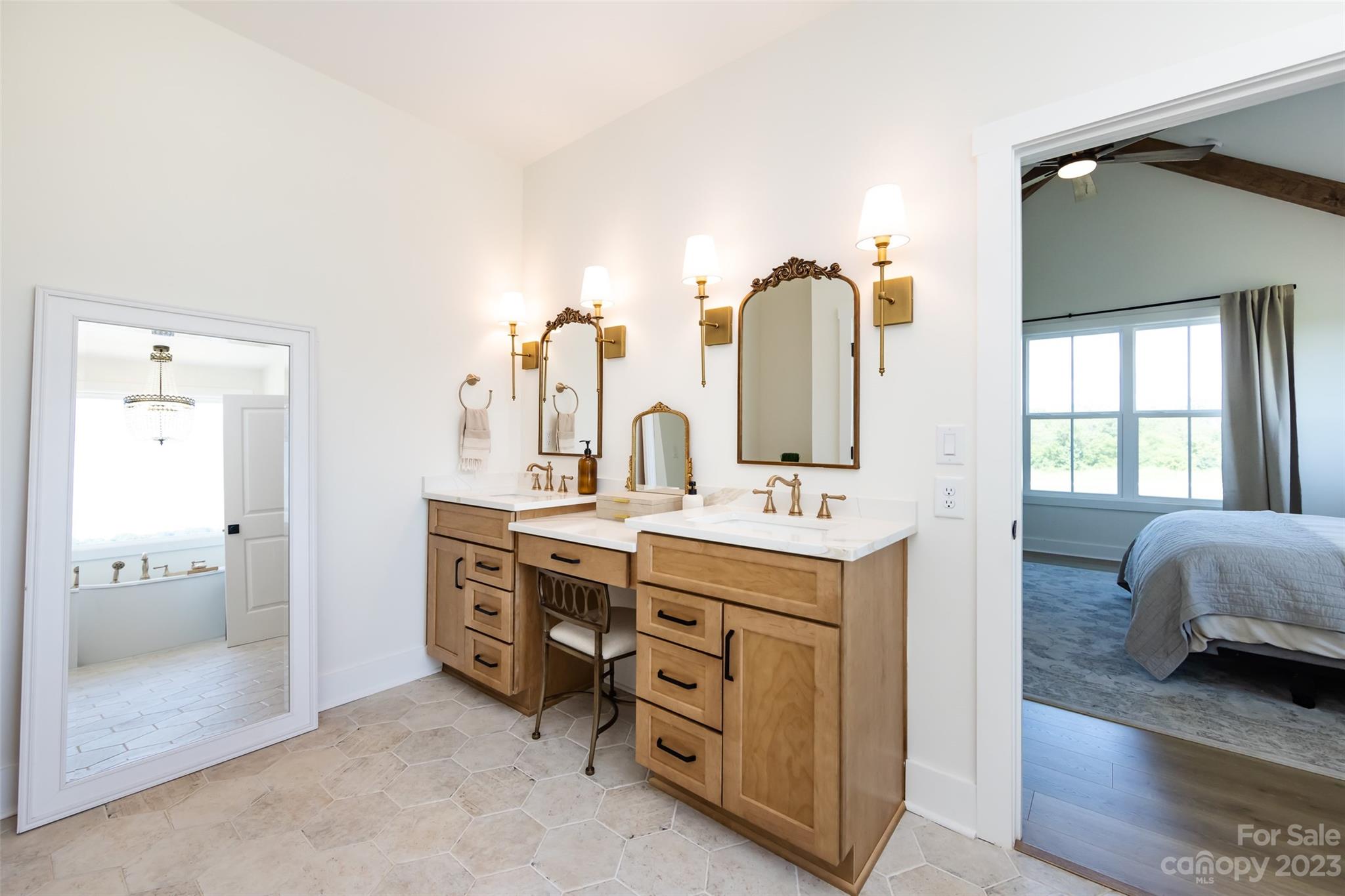 4316 Nesbit Road Monroe, NC 28112 - Photo 18 of 47 a view of hallway with sink and mirror