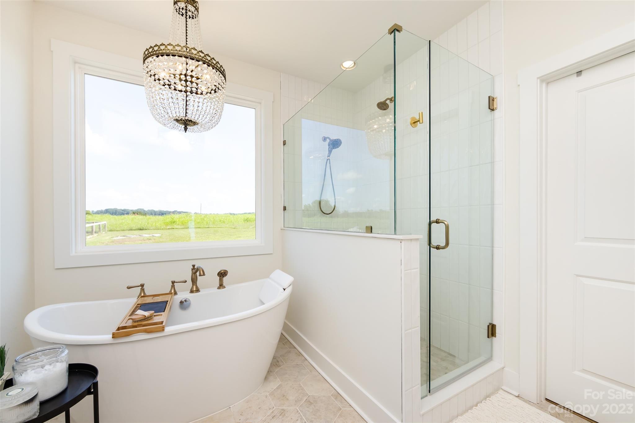 4316 Nesbit Road Monroe, NC 28112 - Photo 20 of 47 a bathroom with a tub a sink and a window