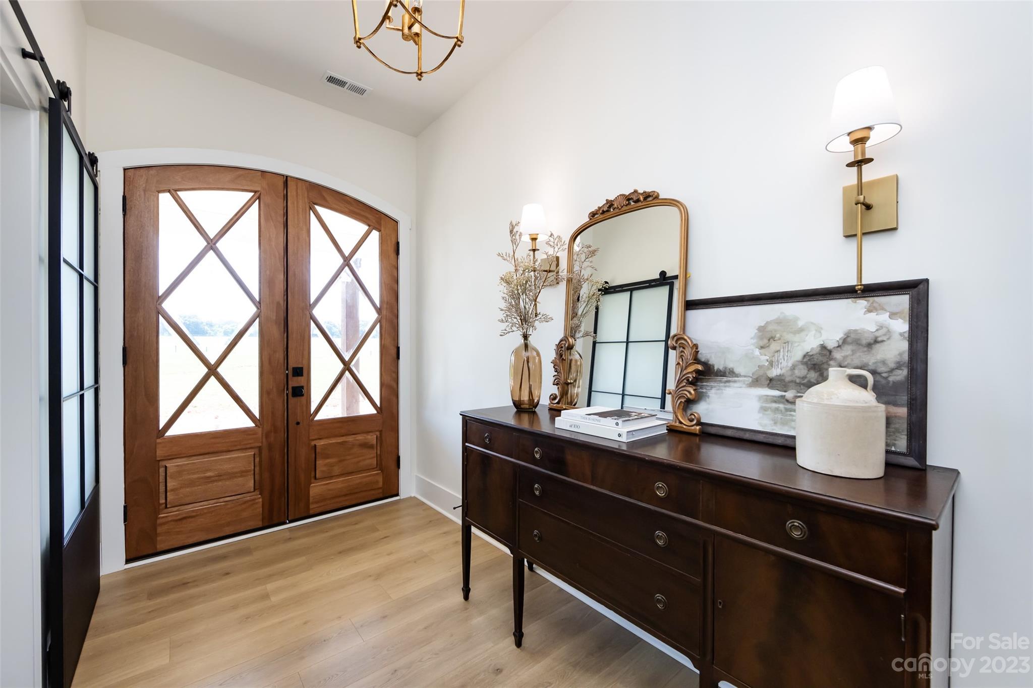 4316 Nesbit Road Monroe, NC 28112 - Photo 2 of 47 a view of room with furniture and wooden floor