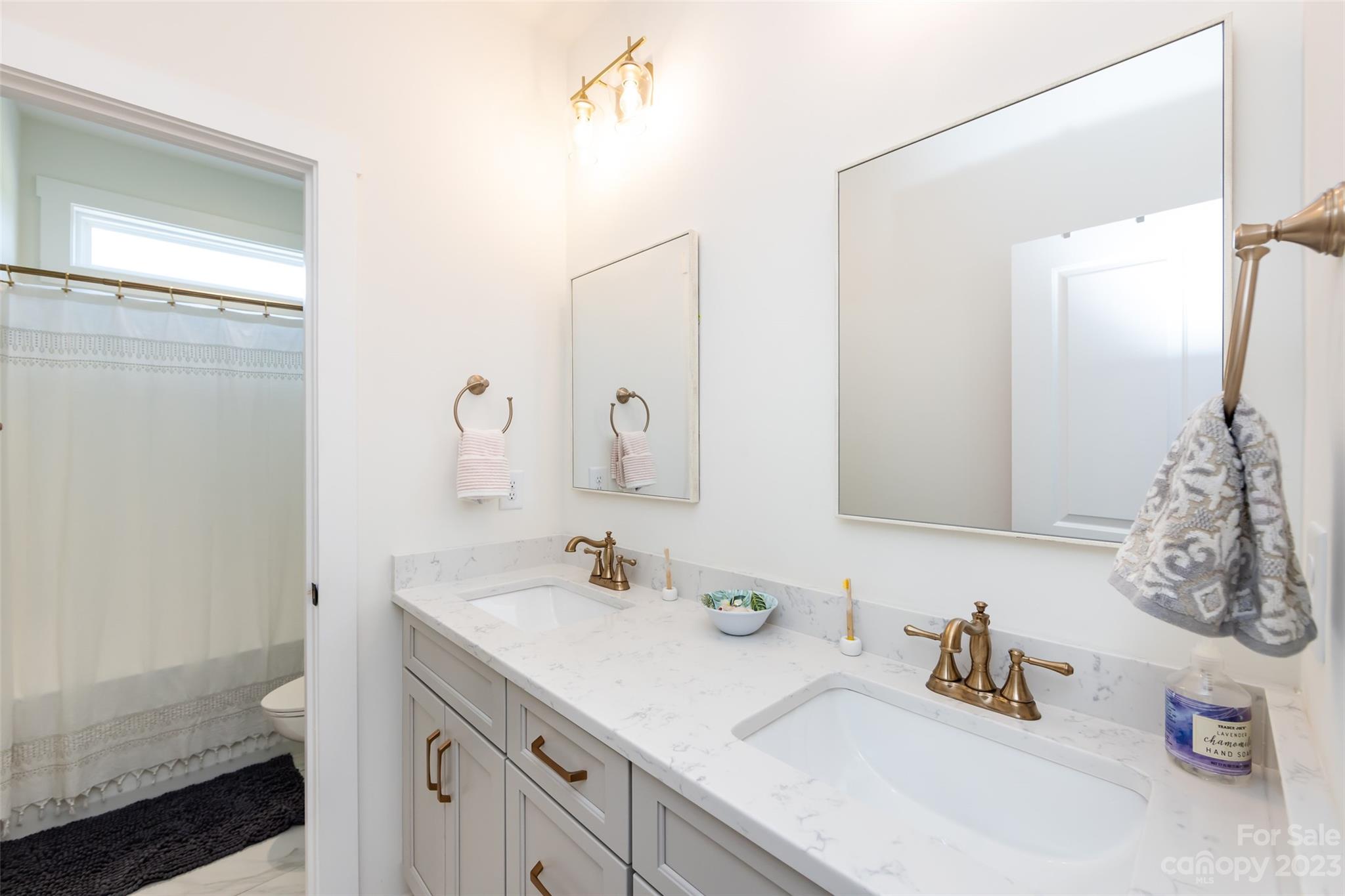 4316 Nesbit Road Monroe, NC 28112 - Photo 22 of 47 a bathroom with a sink and a mirror