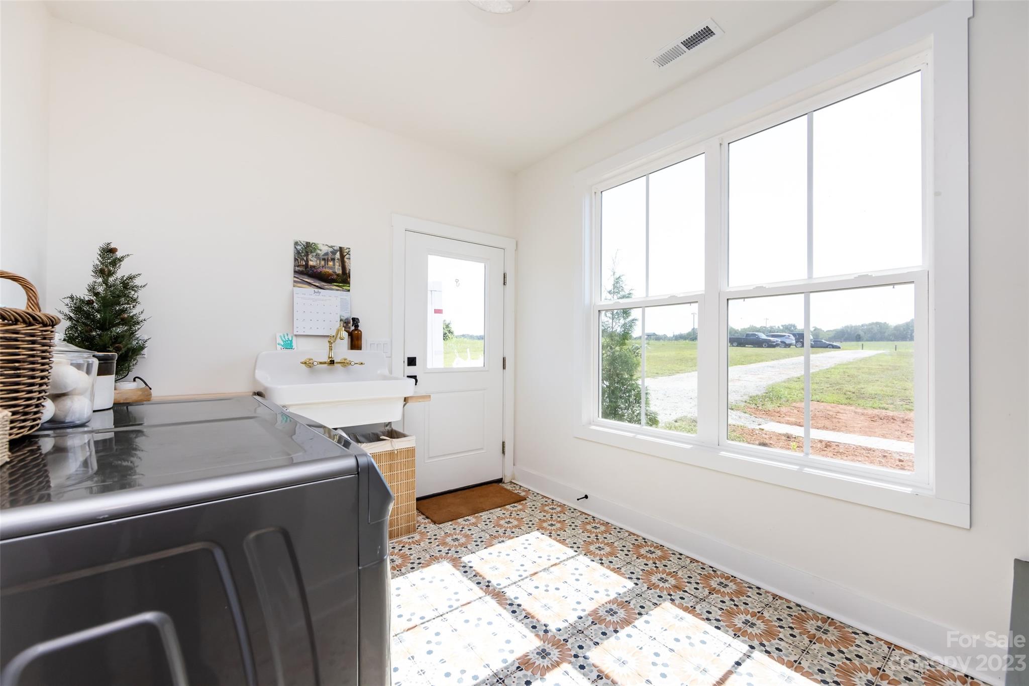 4316 Nesbit Road Monroe, NC 28112 - Photo 28 of 47 a kitchen with a sink cabinets and window