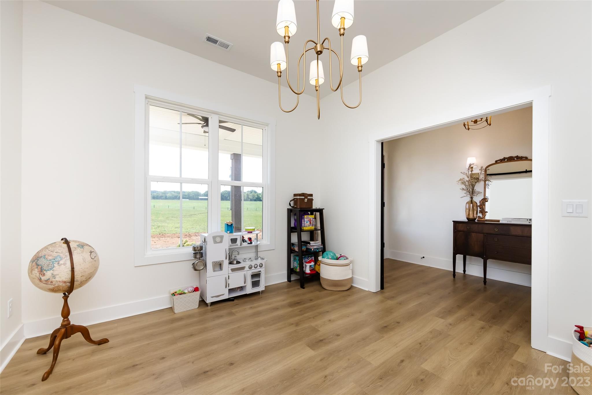 4316 Nesbit Road Monroe, NC 28112 - Photo 32 of 47 a view of a livingroom with furniture a chandelier