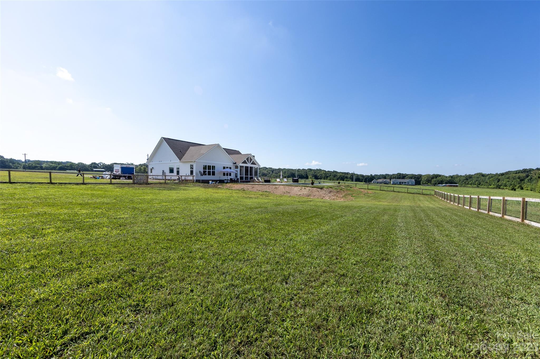 4316 Nesbit Road Monroe, NC 28112 - Photo 39 of 47 a view of a lake with houses in the background
