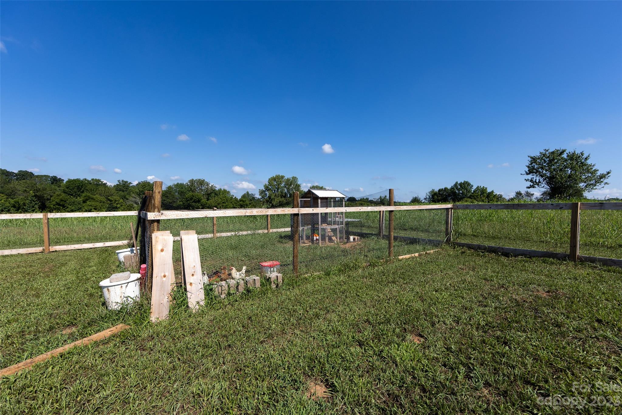 4316 Nesbit Road Monroe, NC 28112 - Photo 40 of 47 a view of a golf course with a lake