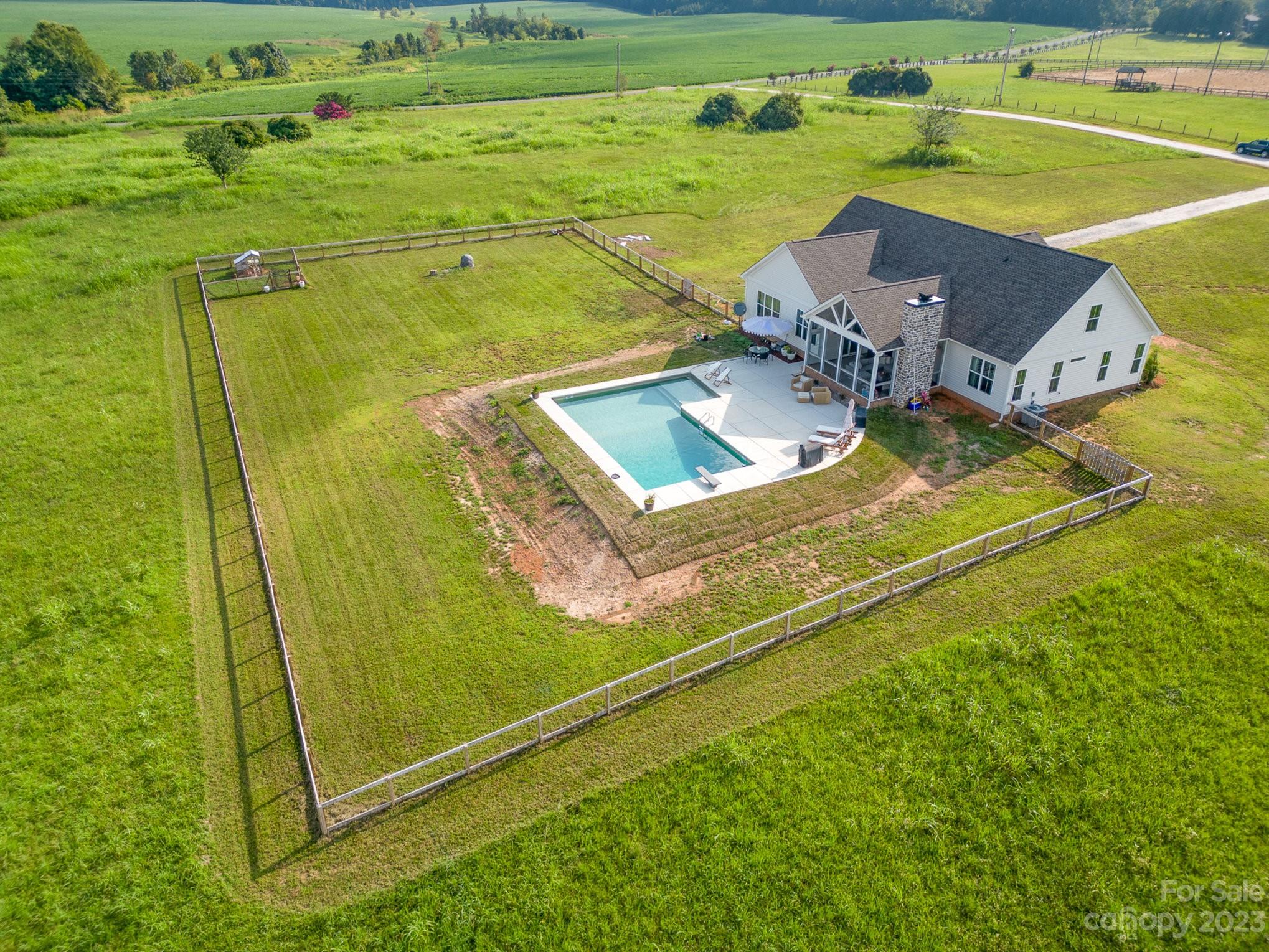 4316 Nesbit Road Monroe, NC 28112 - Photo 43 of 47 a view of a swimming pool with a yard