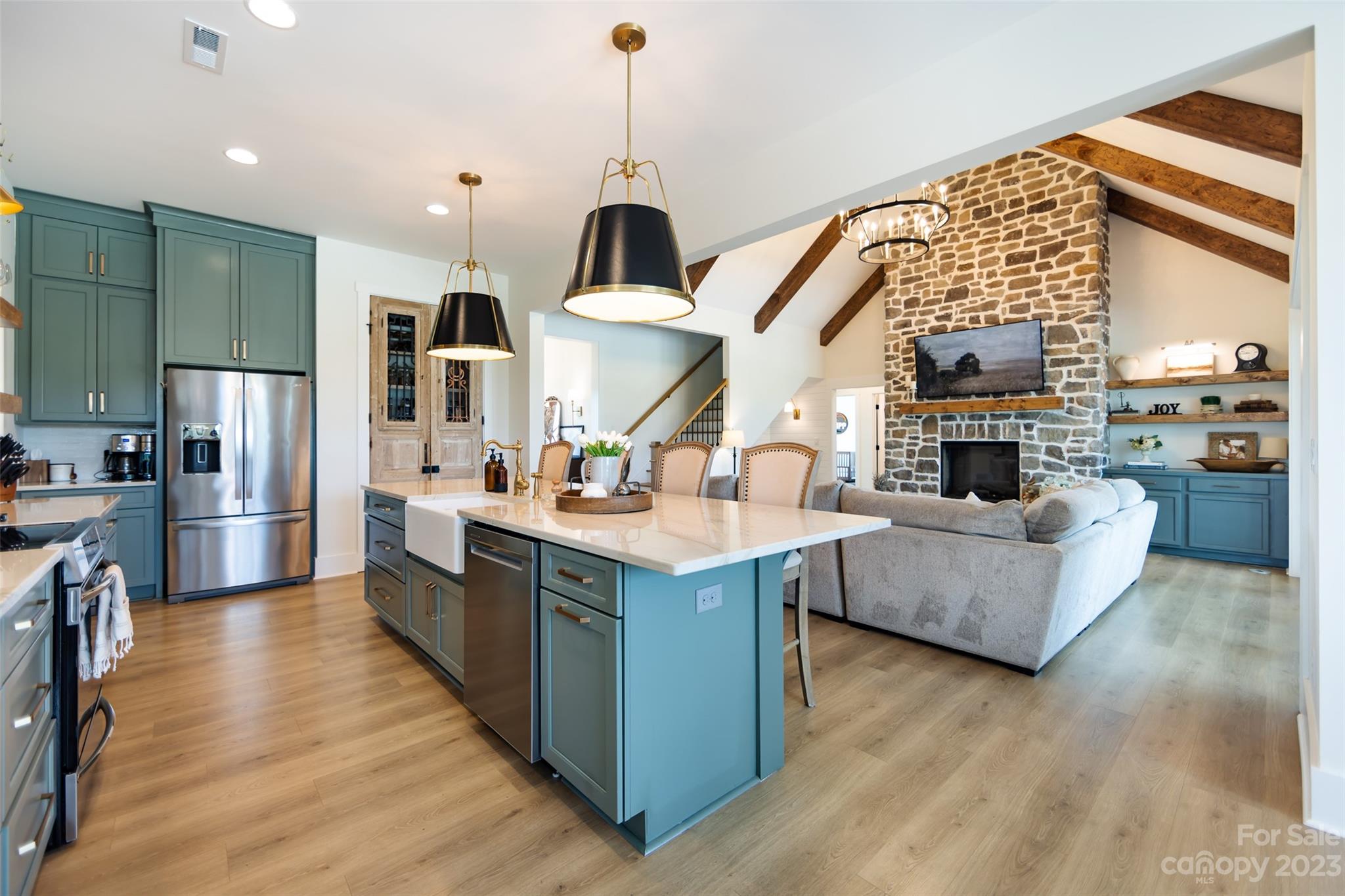 4316 Nesbit Road Monroe, NC 28112 - Photo 7 of 47 a kitchen with stainless steel appliances granite countertop a stove and a refrigerator