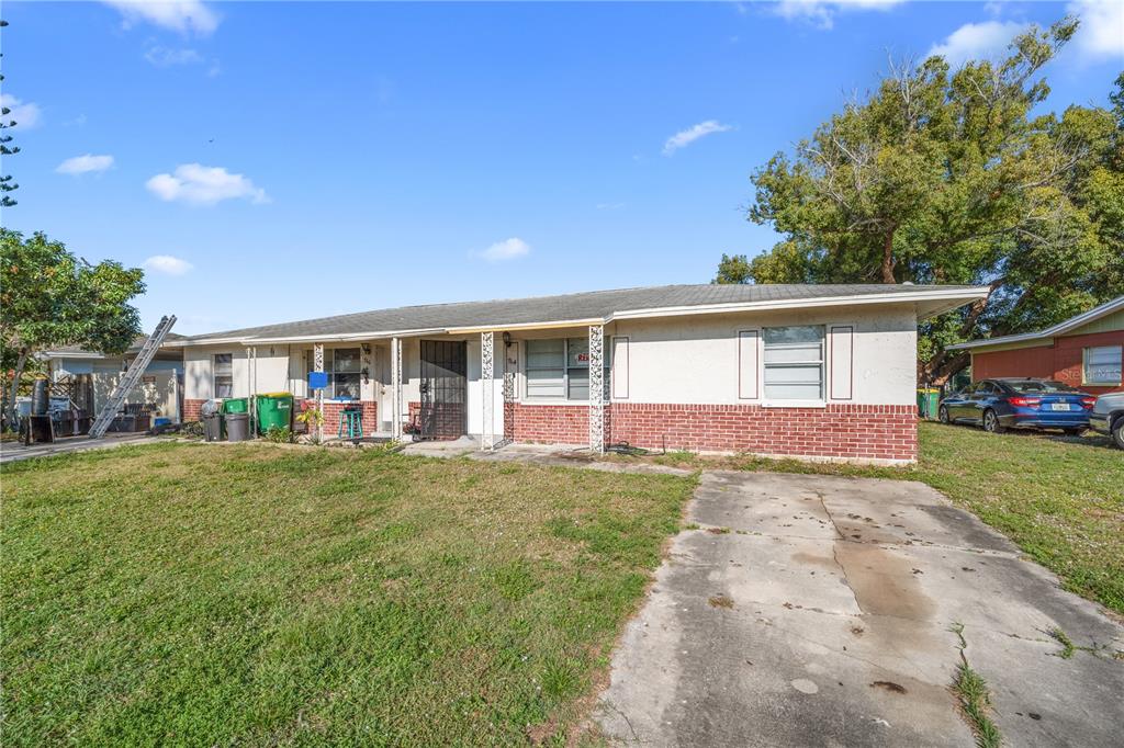 764 Lunar Lake Circle Cocoa, FL 32926 - Photo 1 of 17 front view of a house with a garden