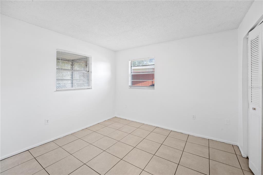 764 Lunar Lake Circle Cocoa, FL 32926 - Photo 12 of 17 a view of an empty room and window