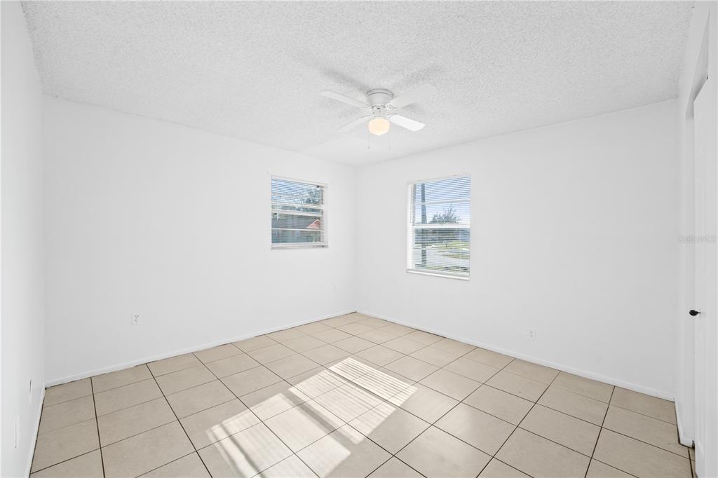 764 Lunar Lake Circle Cocoa, FL 32926 - Photo 17 of 17 an empty room with windows