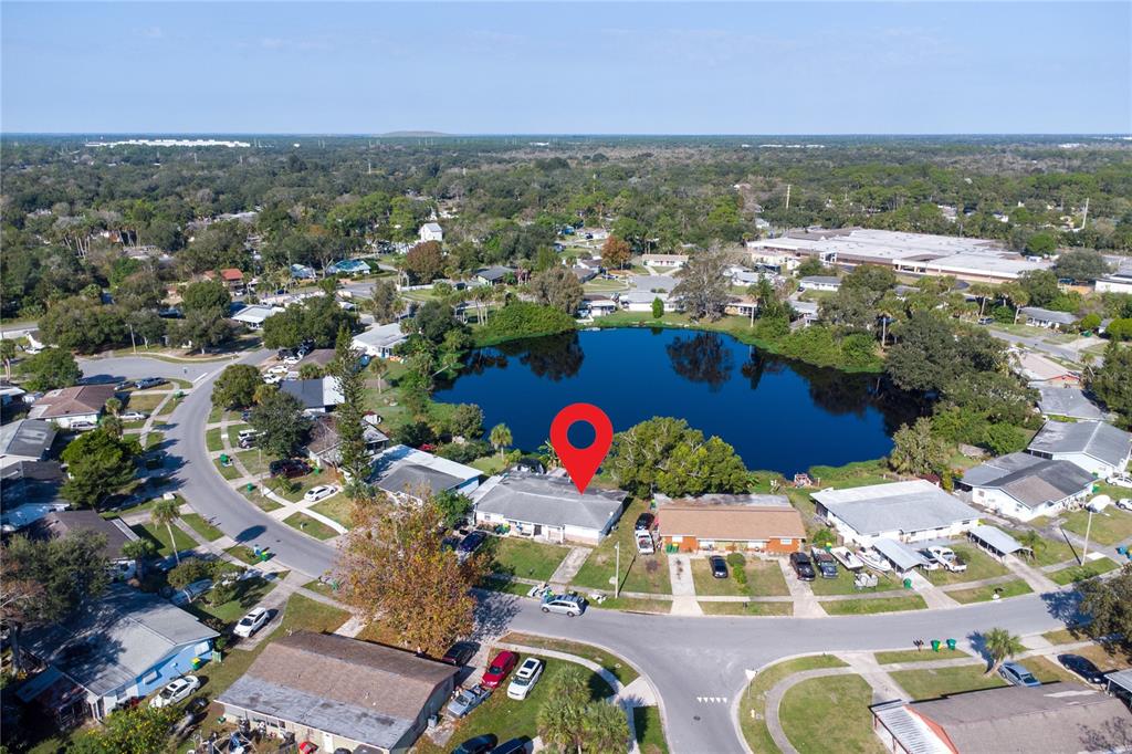 764 Lunar Lake Circle Cocoa, FL 32926 - Photo 7 of 17 an aerial view of residential houses with outdoor space