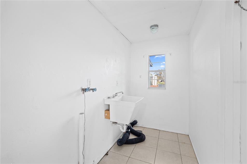 764 Lunar Lake Circle Cocoa, FL 32926 - Photo 10 of 17 a bathroom with a bathtub and a shower