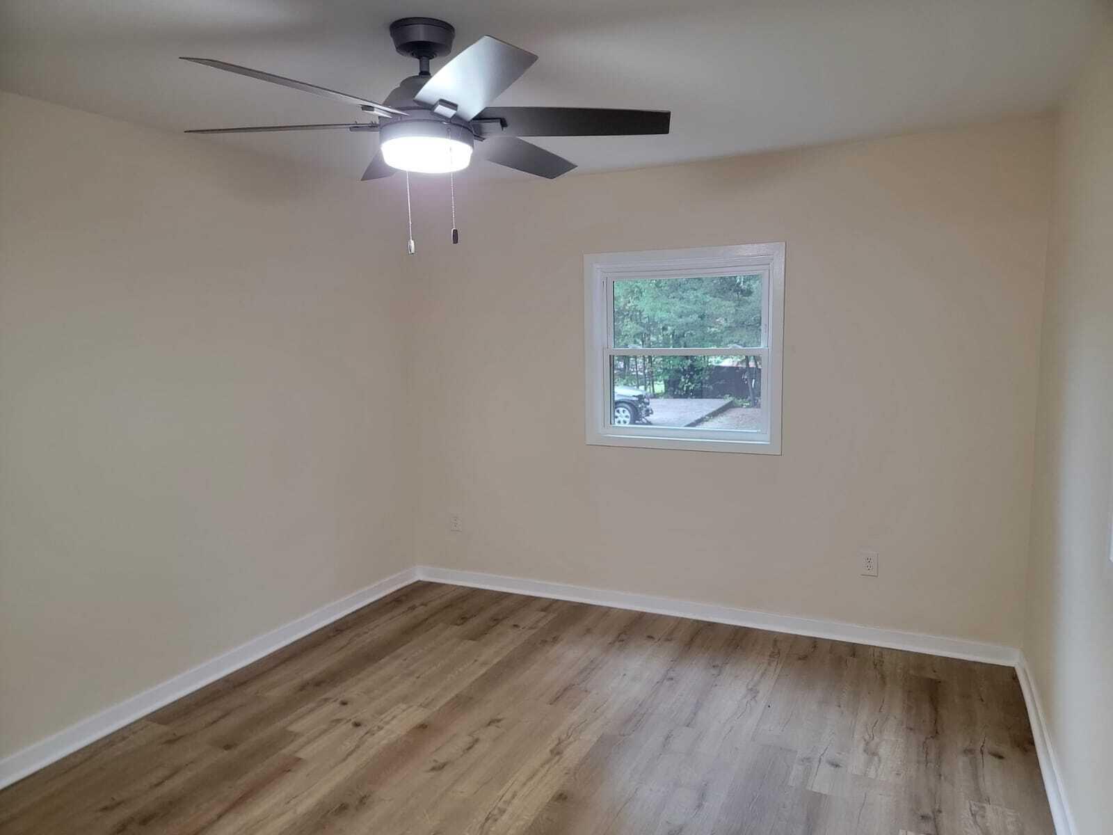 640 Cooks Knob Road Ferrum, VA 24088 - Photo 22 of 50 wooden floor in an empty room with a window