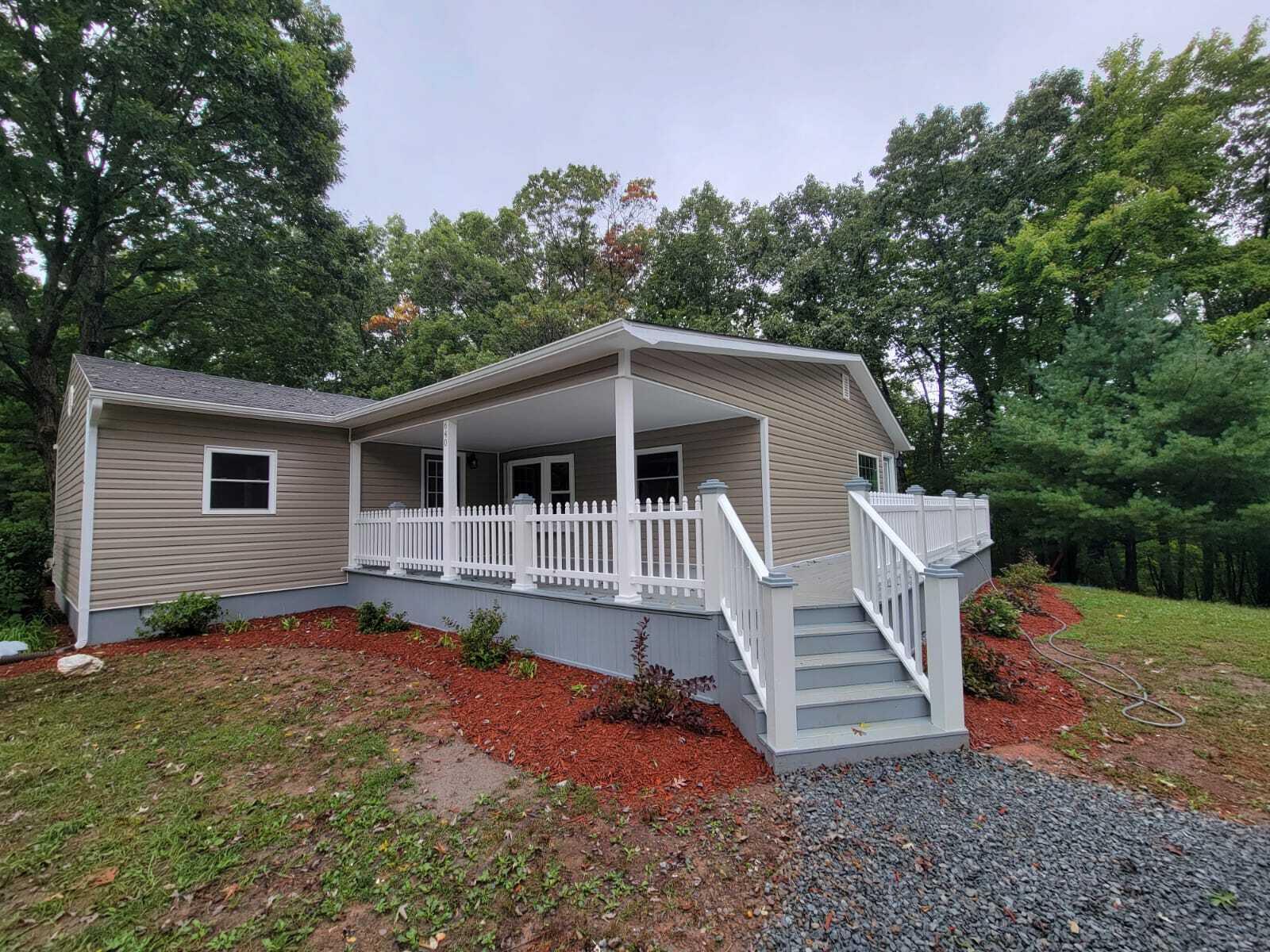 640 Cooks Knob Road Ferrum, VA 24088 - Photo 36 of 50 a house with trees in the background