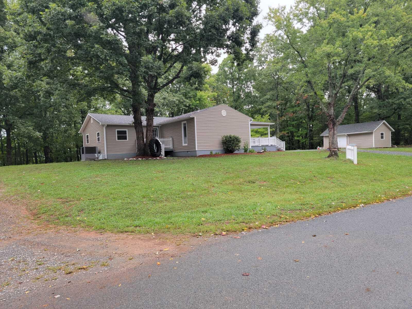 640 Cooks Knob Road Ferrum, VA 24088 - Photo 38 of 50 a house with a yard and a large tree