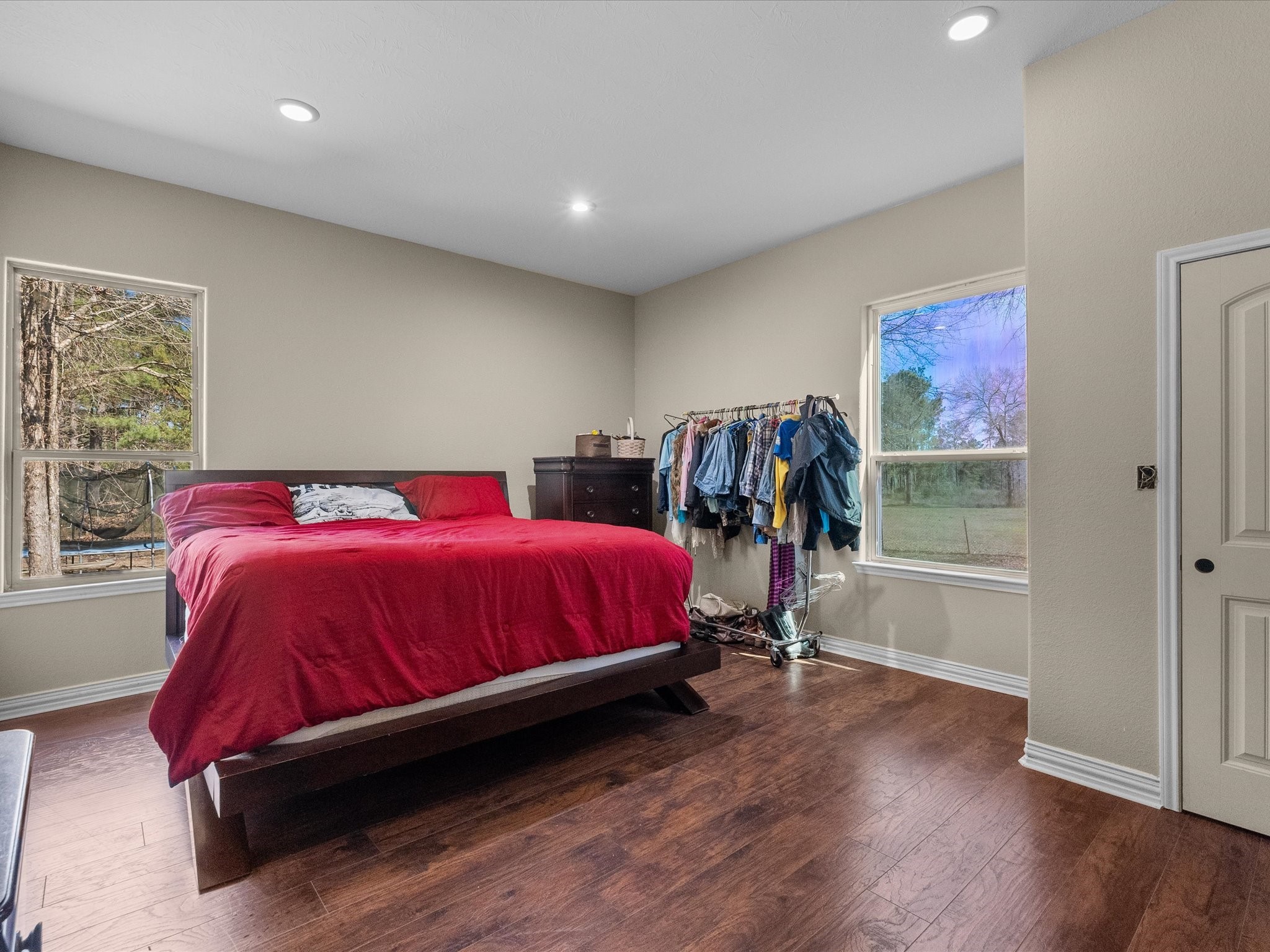 1151 County Line Road Shepherd, TX 77371 - Photo 17 of 40 a bed sitting in a bedroom next to a window