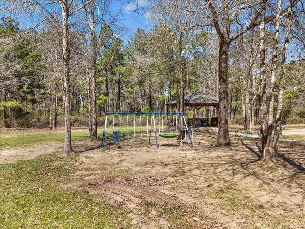 a view of a park with swings