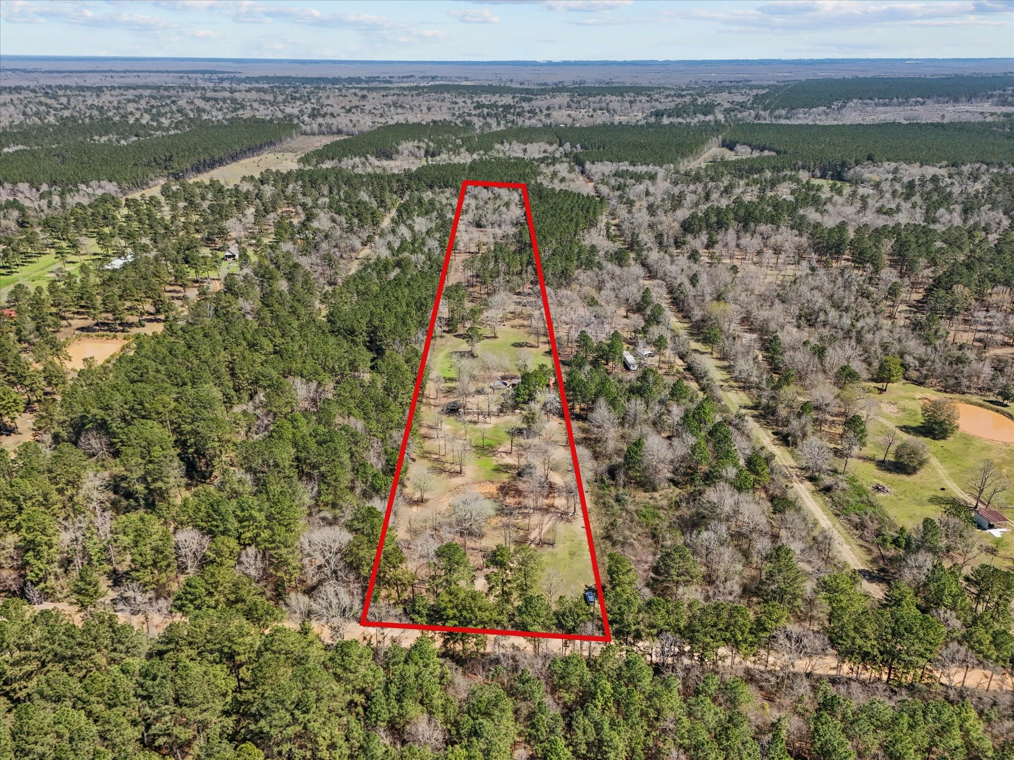 1151 County Line Road Shepherd, TX 77371 - Photo 3 of 40 a view of a city