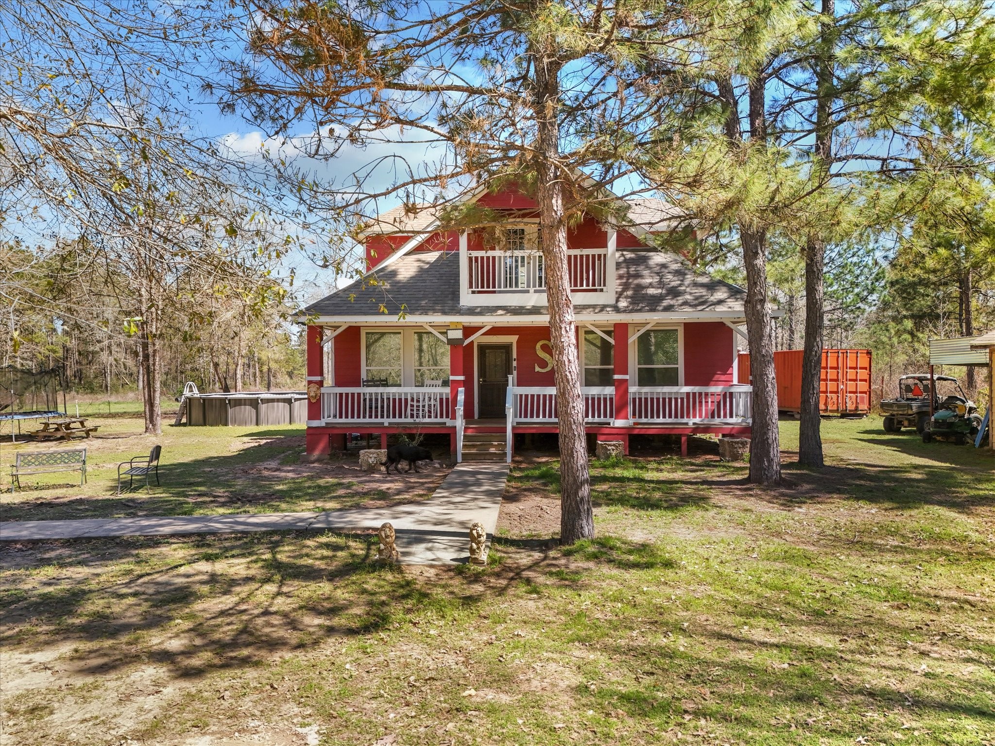 1151 County Line Road Shepherd, TX 77371 - Photo 37 of 40 a view of a town with large trees