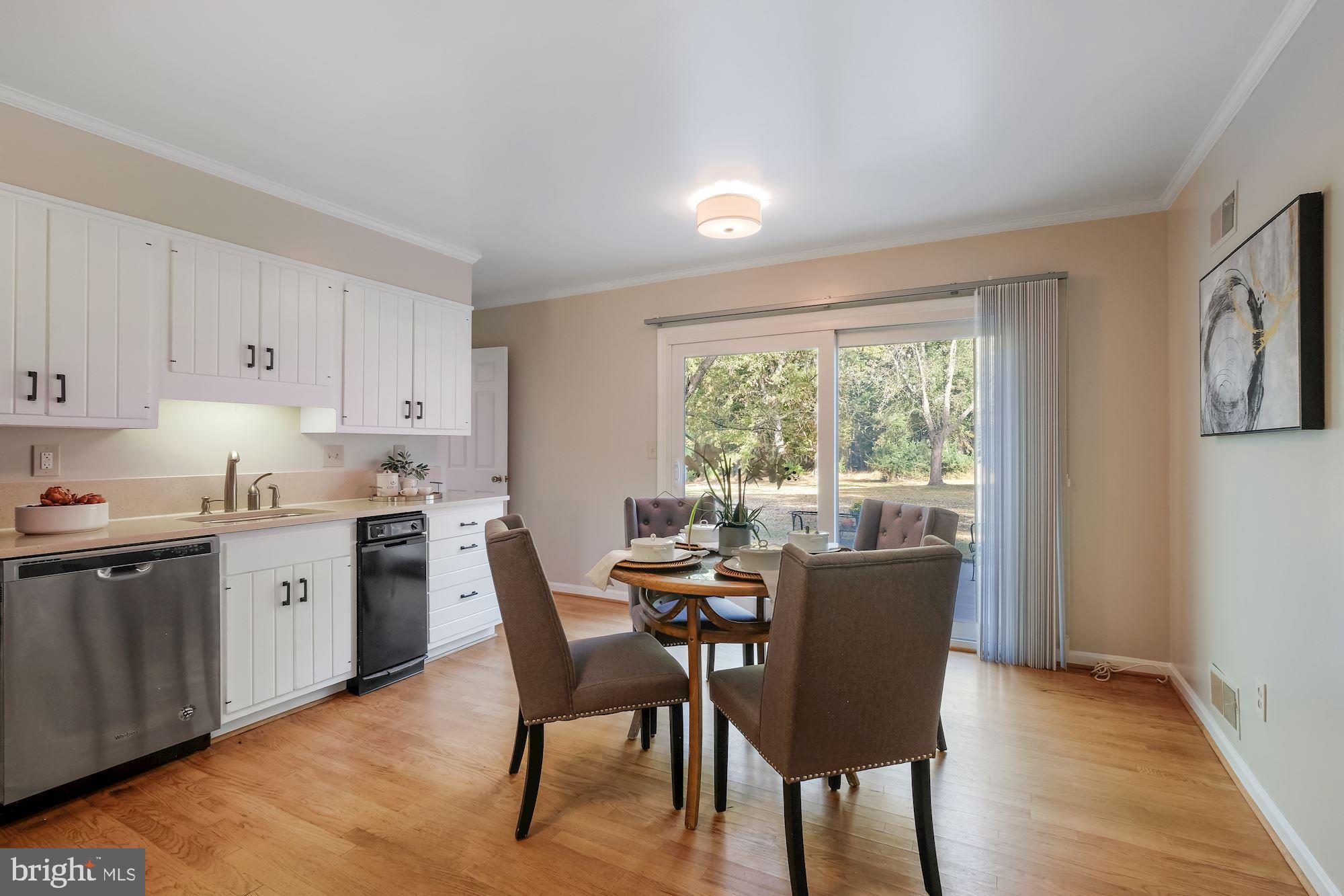 14829 Spring Meadows Drive Darnestown, MD 20874 - Photo 19 of 52 Sliders to terrace to enjoy your morning coffee!