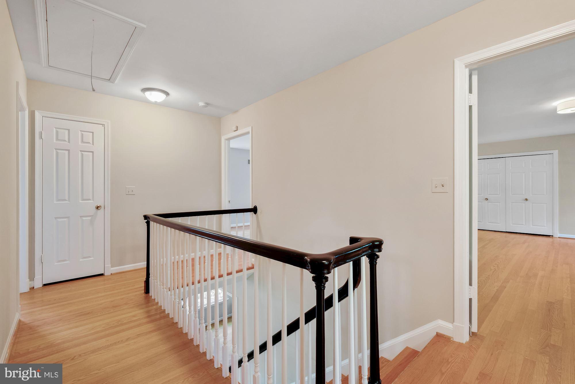 14829 Spring Meadows Drive Darnestown, MD 20874 - Photo 21 of 52 Upper landing and pull down attic access