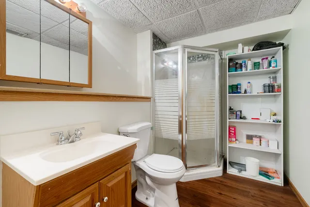 a bathroom with a sink toilet and vanity