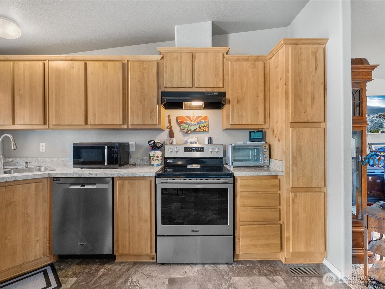 12721 West Macs Loop Road Granite Falls, WA 98252 - Photo 11 of 31 a kitchen with a stove and a sink