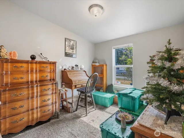 a view of a livingroom with furniture