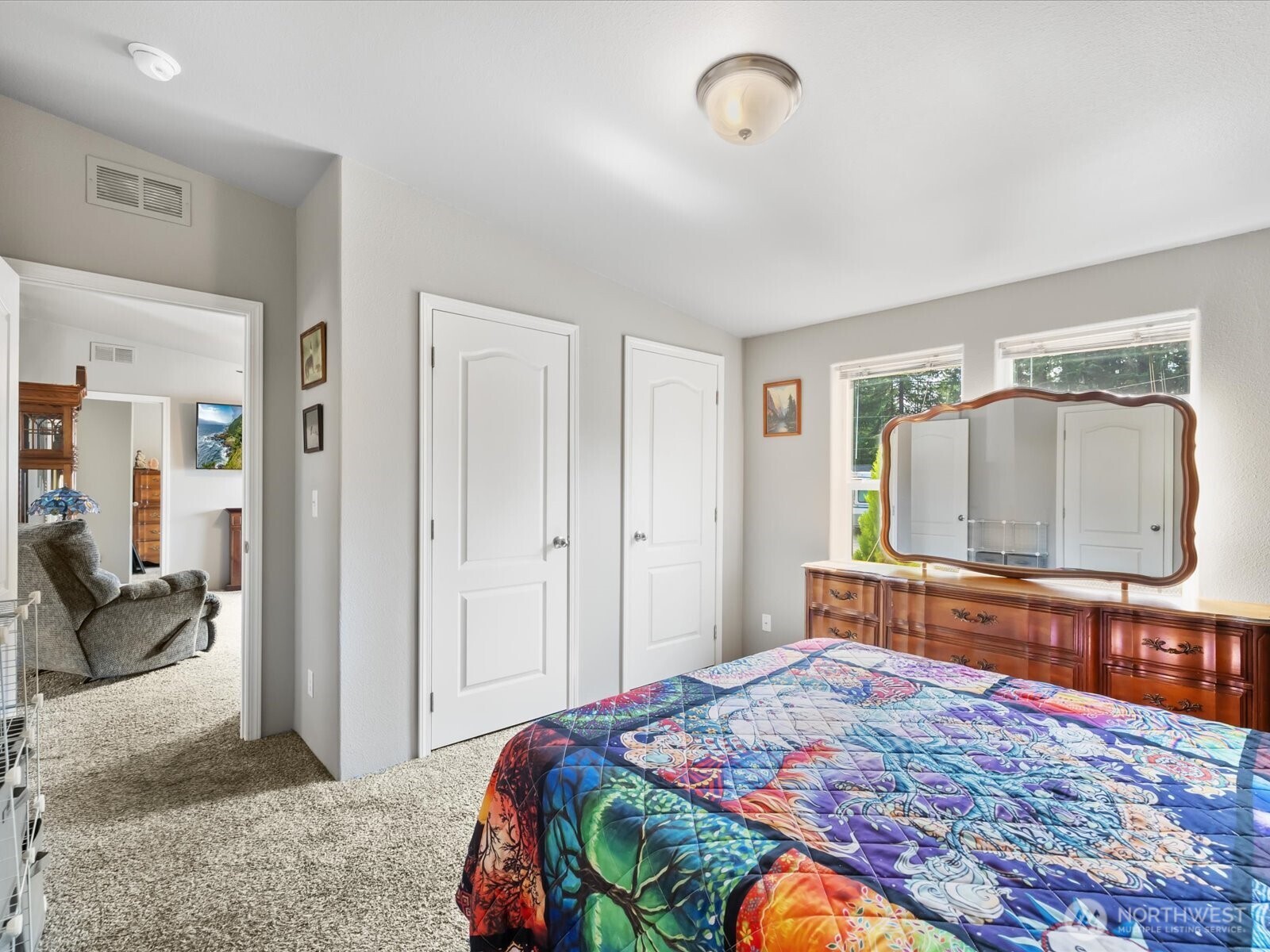 12721 West Macs Loop Road Granite Falls, WA 98252 - Photo 23 of 31 a bedroom with a bed and a flat screen tv