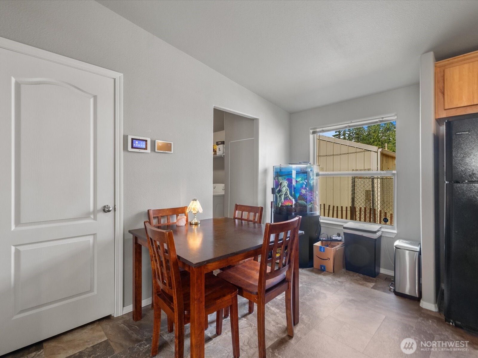 12721 West Macs Loop Road Granite Falls, WA 98252 - Photo 10 of 31 a dining room with furniture and window