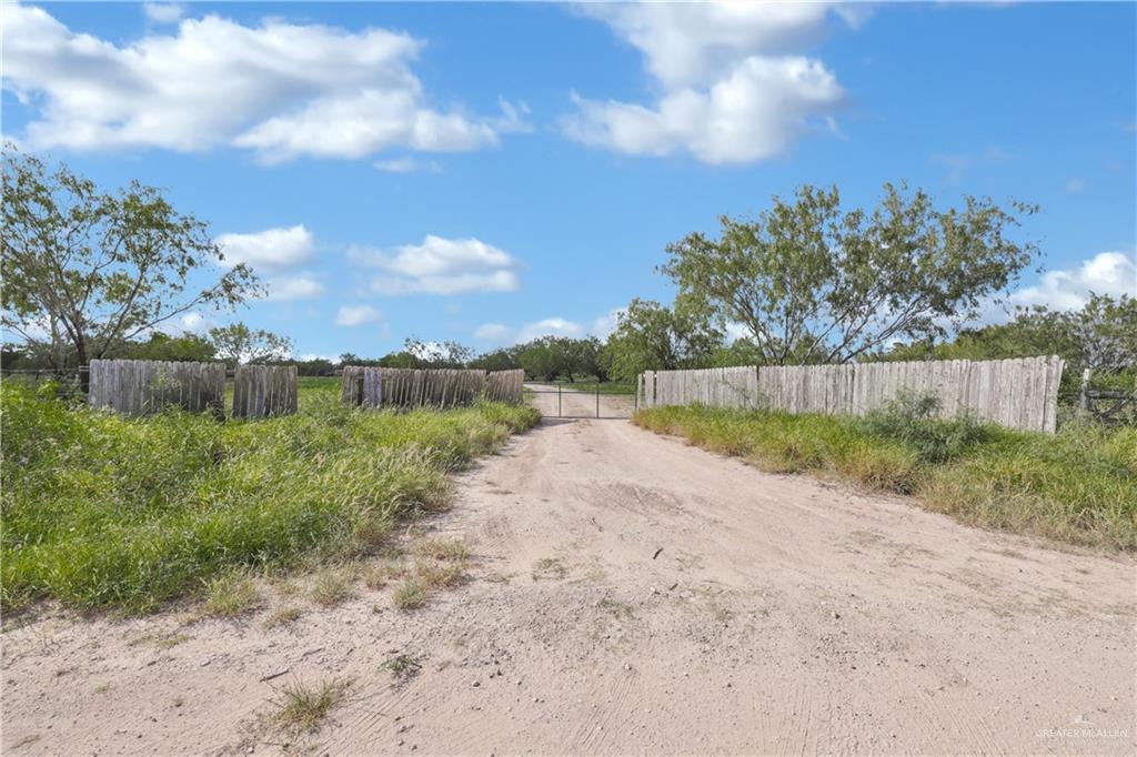0 North Moorefield Road Edinburg, TX 78541 - Photo 3 of 16 a view of a yard with wooden fence