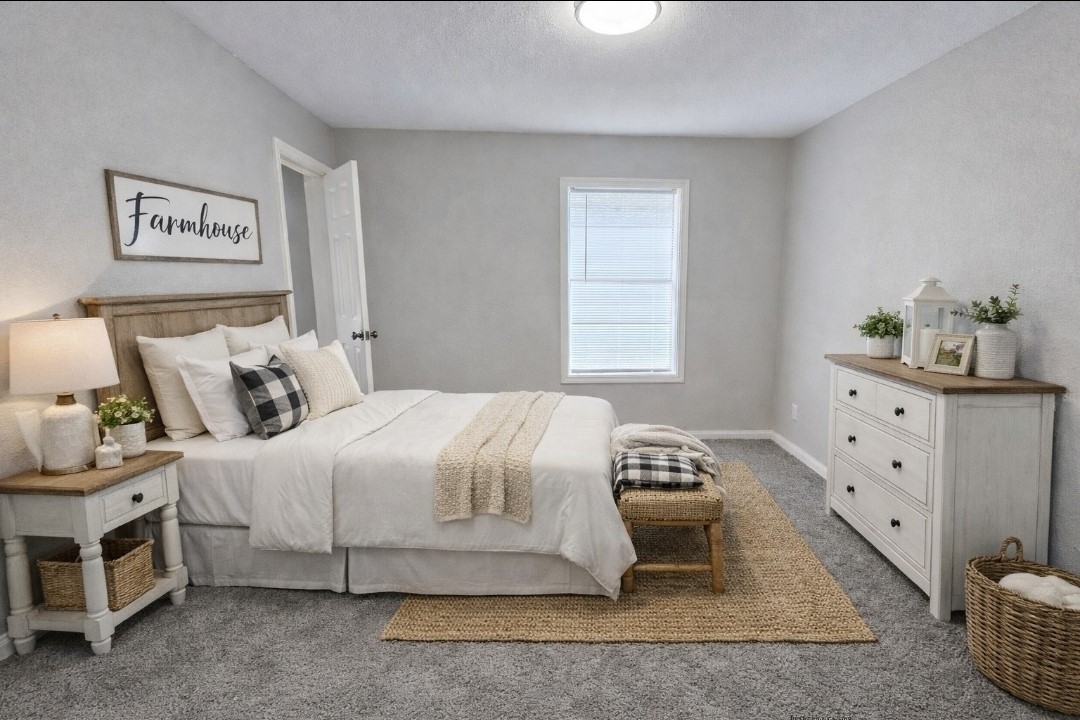 309 E Pine Daisetta, TX 77533 - Photo 7 of 23 a bedroom with a bed and a dresser