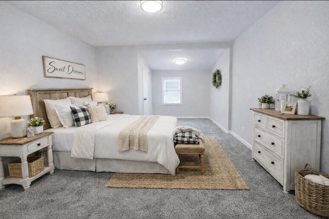 309 E Pine Daisetta, TX 77533 - Photo 10 of 23 a bedroom with a bed and a dresser