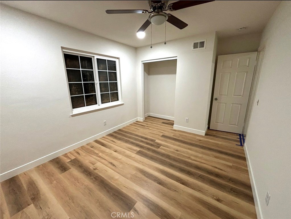 1164 Massachusetts Avenue Riverside, CA 92507 - Photo 8 of 14 a view of an empty room with a window