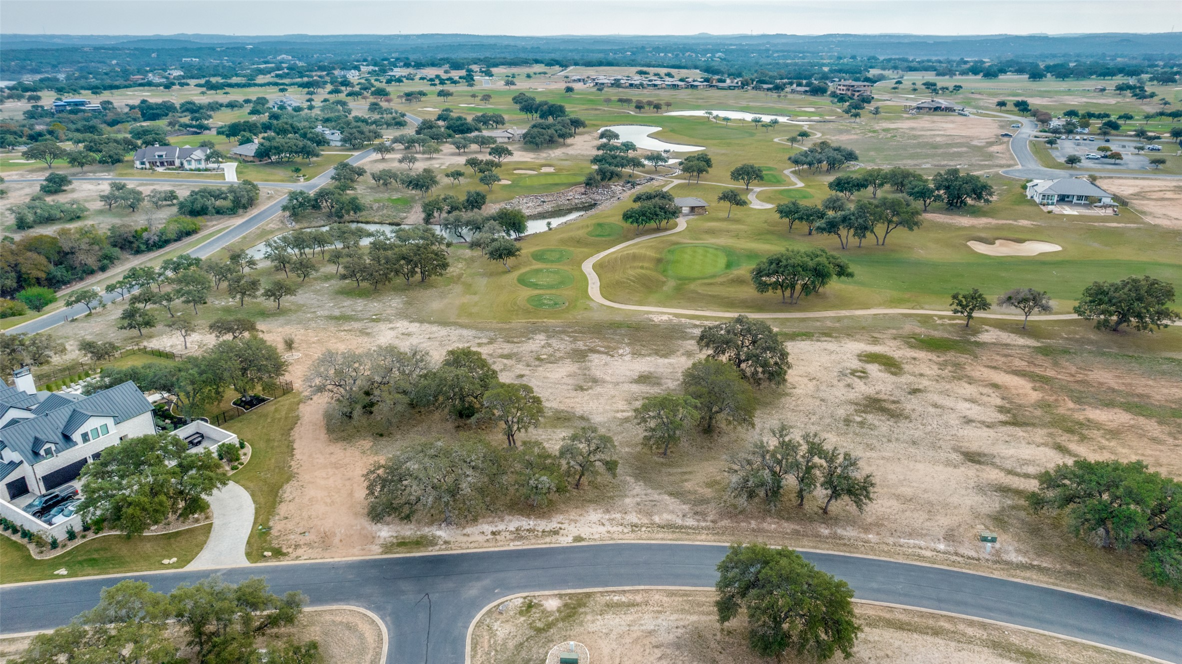 2711 Cliff Point Spicewood, TX 78669 - Photo 12 of 22 an aerial view of residential houses with outdoor space
