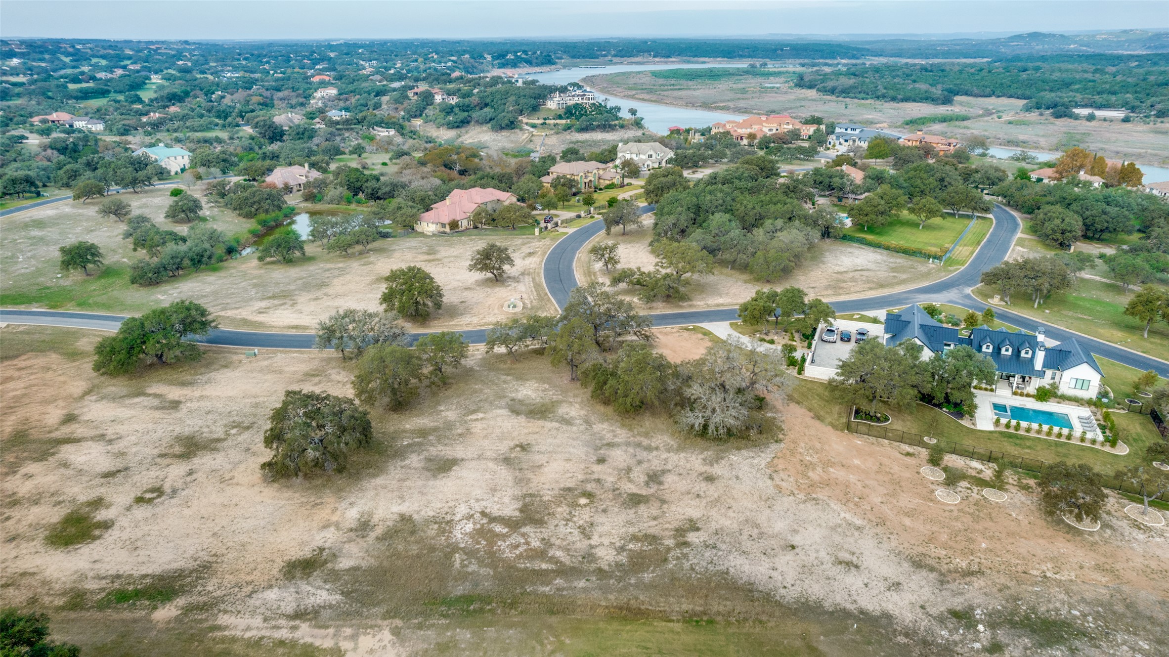 2711 Cliff Point Spicewood, TX 78669 - Photo 13 of 22 an aerial view of a houses with outdoor space