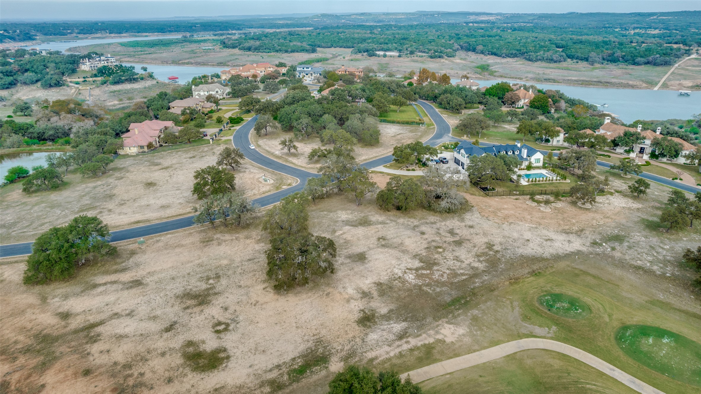 2711 Cliff Point Spicewood, TX 78669 - Photo 14 of 22 an aerial view of a houses with a yard