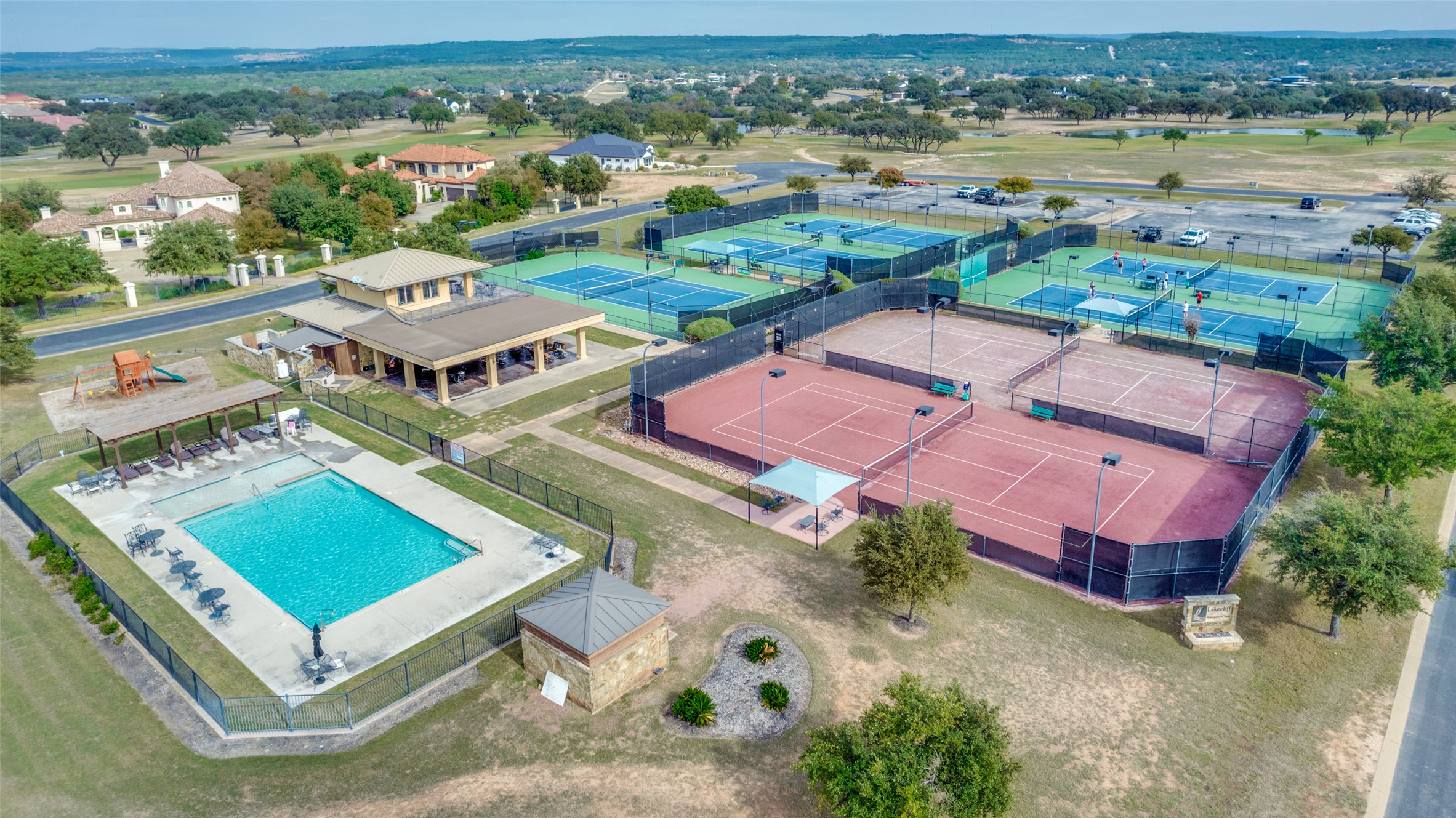 2711 Cliff Point Spicewood, TX 78669 - Photo 19 of 22 an aerial view of residential houses with outdoor space and river