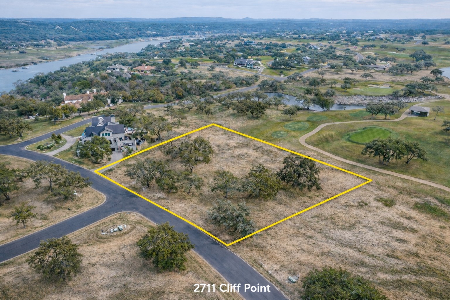 2711 Cliff Point Spicewood, TX 78669 - Photo 2 of 22 a view of a tennis court