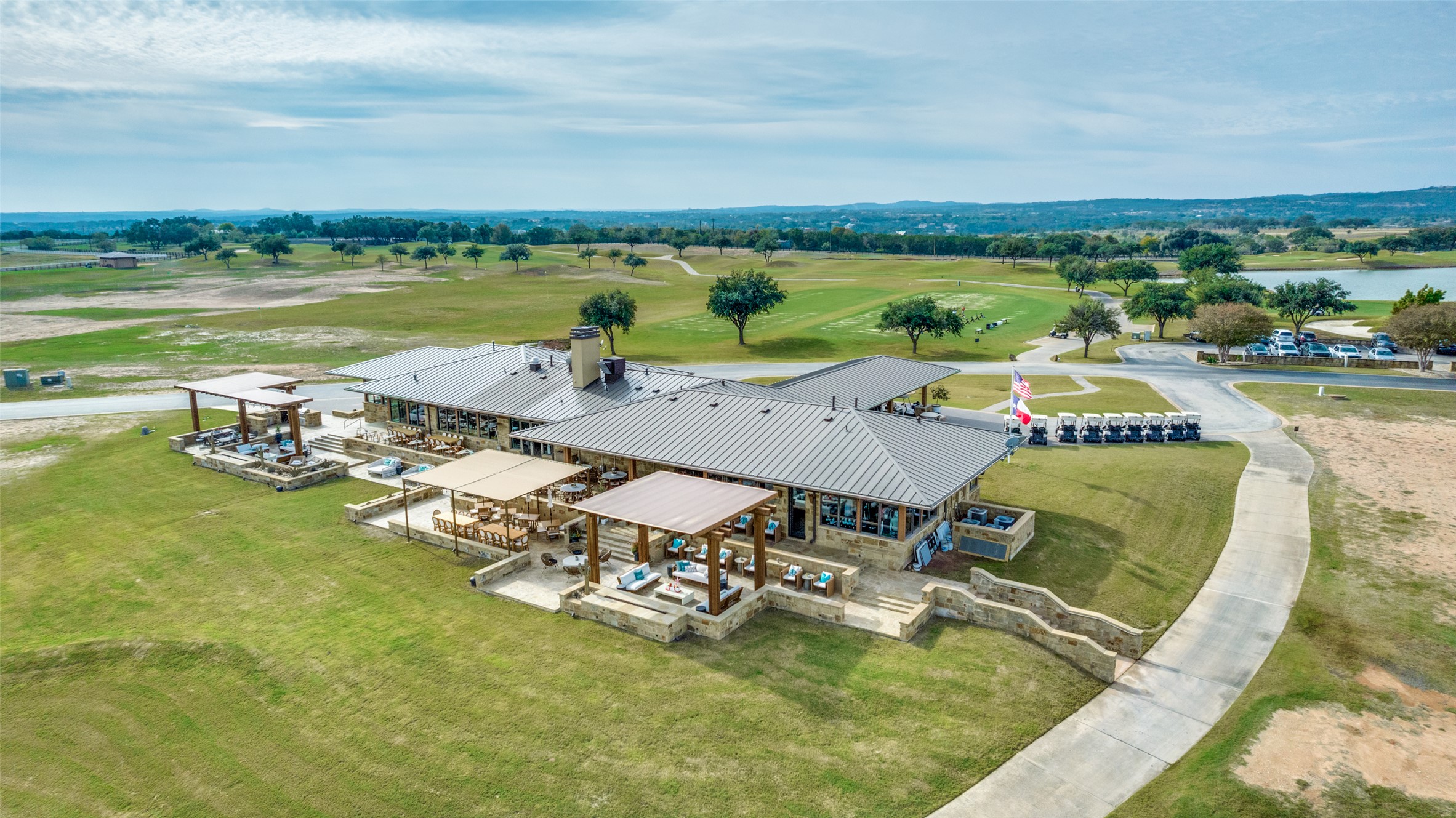 2711 Cliff Point Spicewood, TX 78669 - Photo 22 of 22 a view of a swimming pool and lounge chair