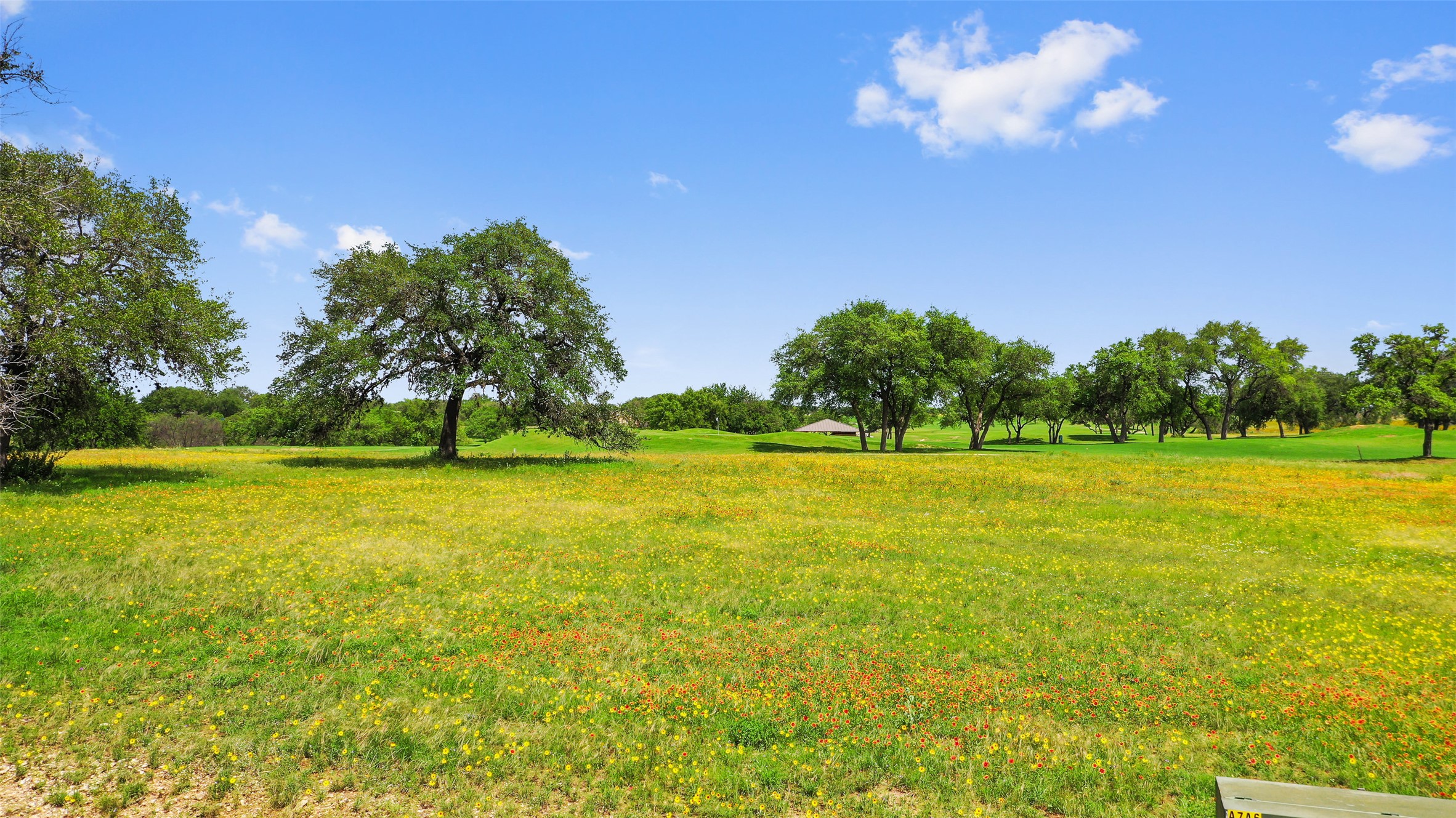 2711 Cliff Point Spicewood, TX 78669 - Photo 6 of 22 a view of a swimming pool with an outdoor space and seating area